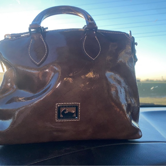 Authentic Dooney and Bourke patent leather satchel/crossbody in a dark brown - Picture 1 of 7